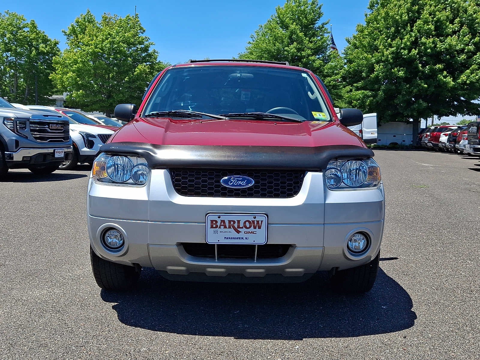 2007 Ford Escape XLT in Red — front three-quarter view