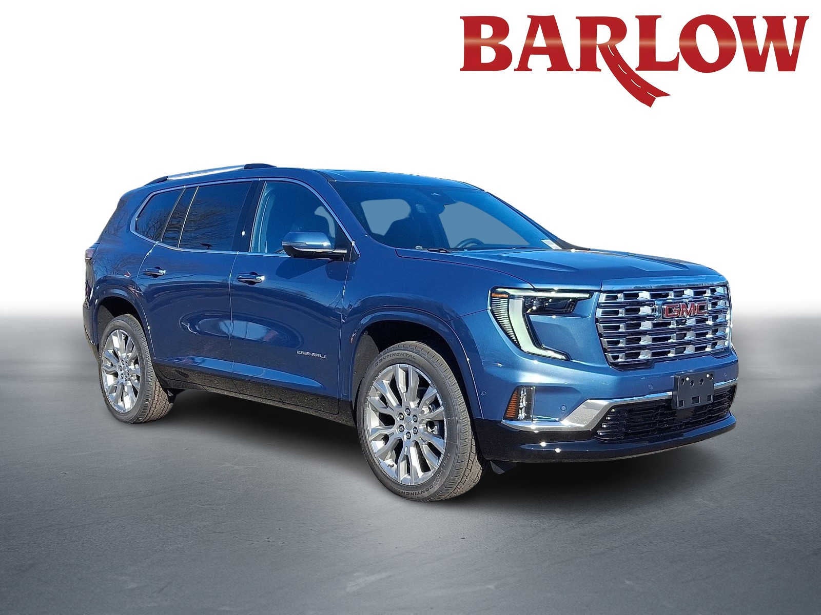 2026 GMC Acadia Denali in Downpour Metallic — front three-quarter view