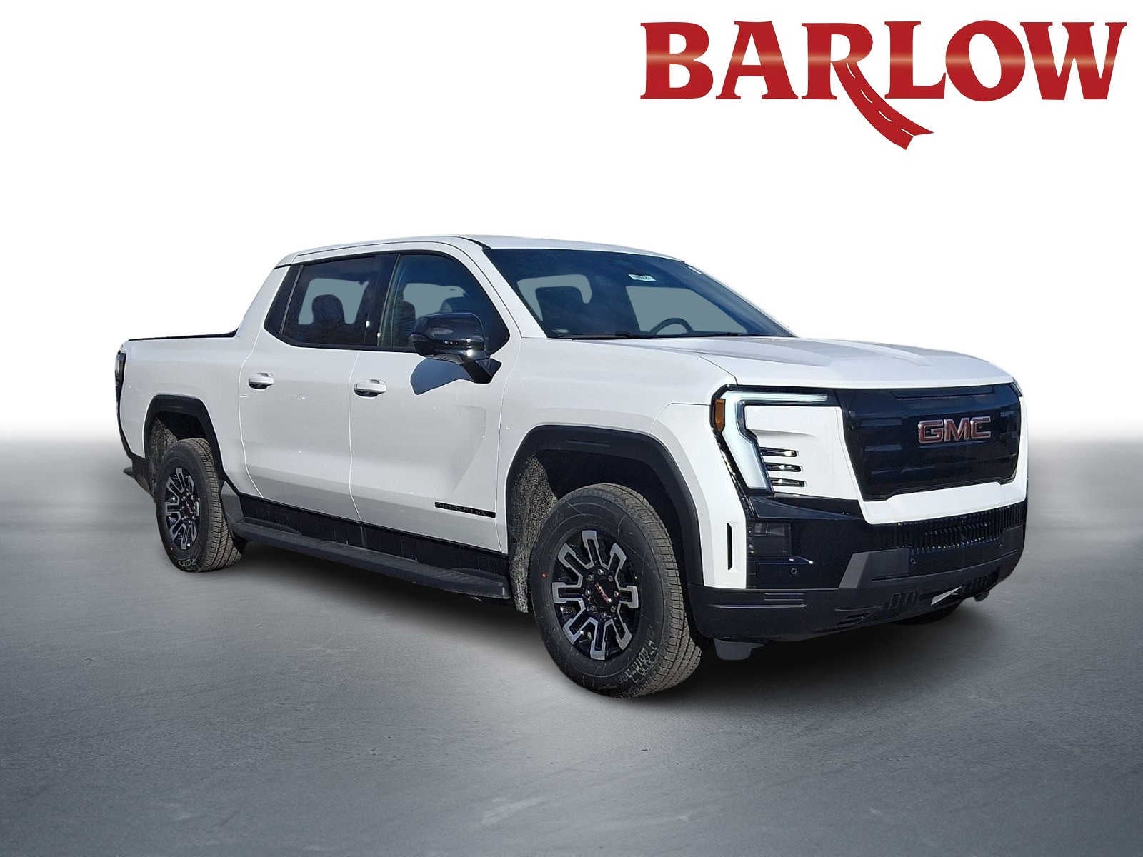 2026 GMC Sierra EV Elevation Extended Range in Summit White — front three-quarter view