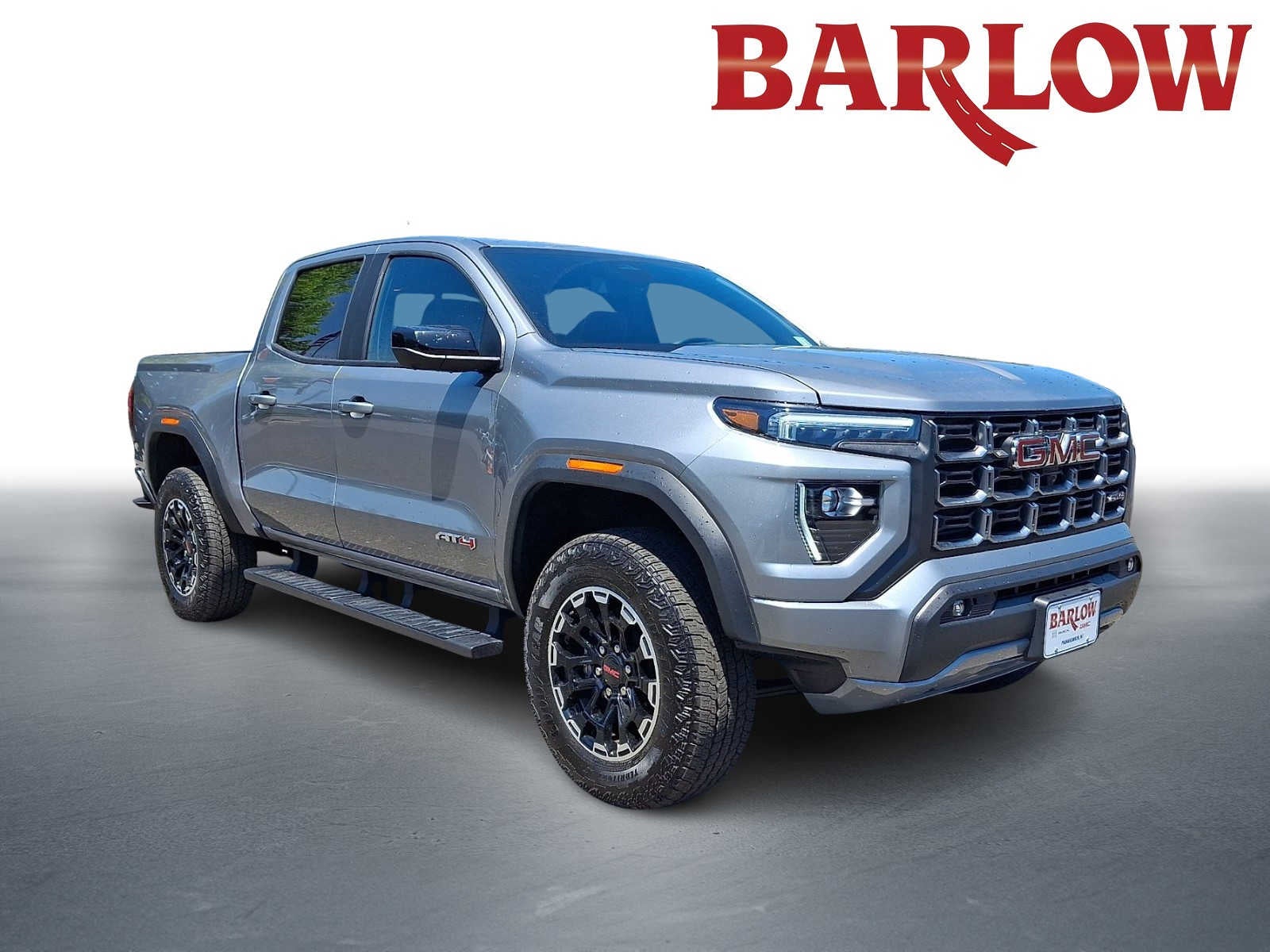 2026 GMC Canyon AT4 in Sterling Metallic — front three-quarter view