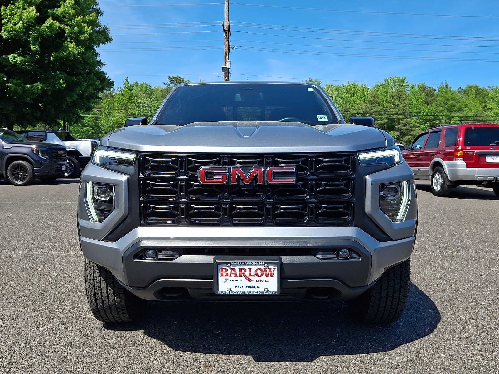 2024 GMC Canyon Elevation in Sterling Metallic — front three-quarter view