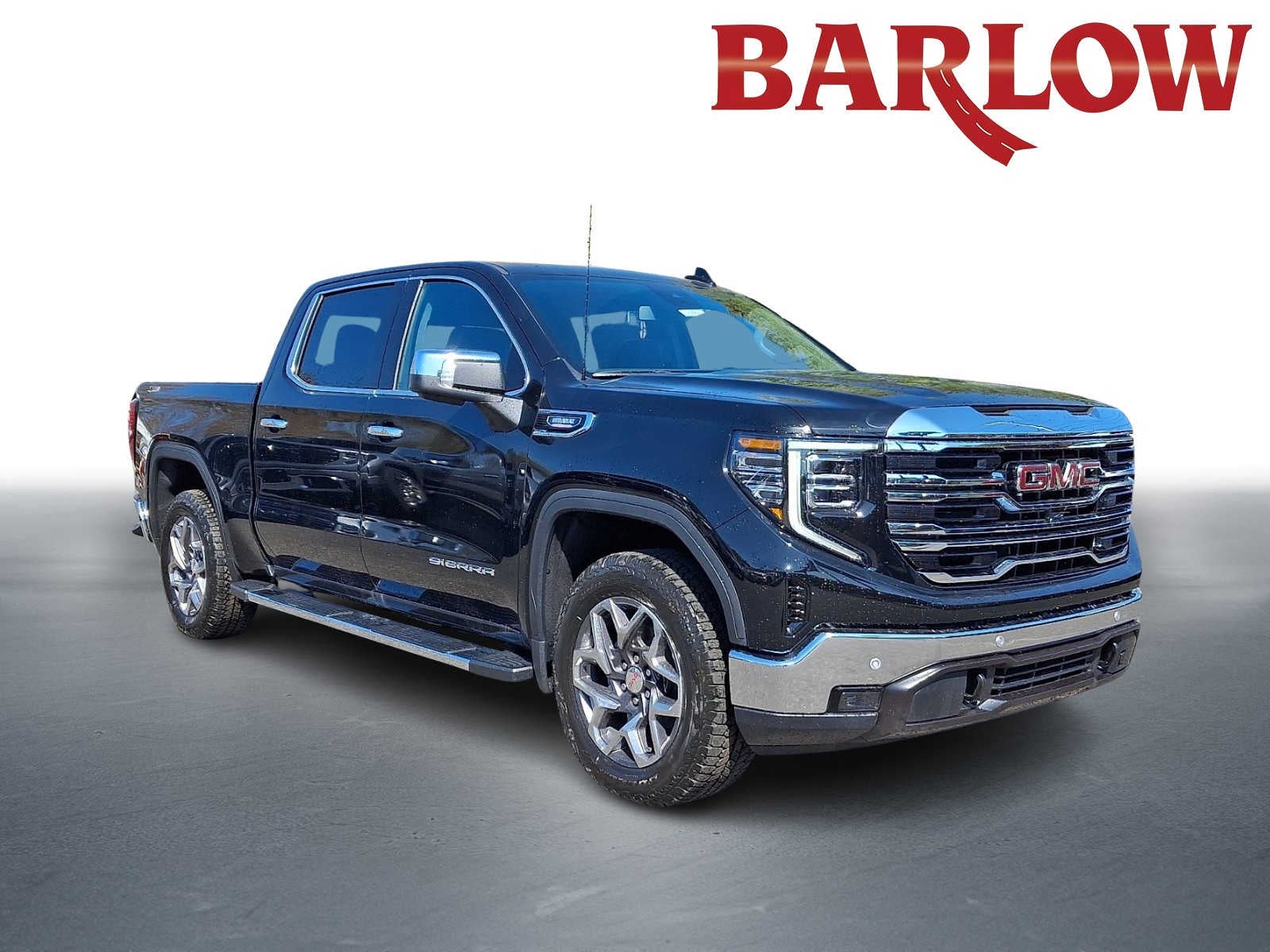 2026 GMC Sierra 1500 SLT in Onyx Black — front three-quarter view