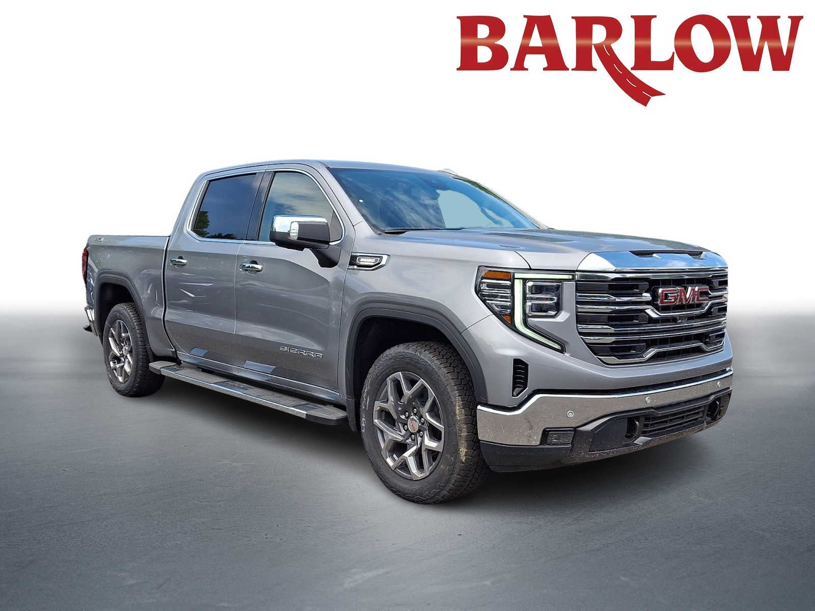 2026 GMC Sierra 1500 SLT in Sterling Metallic — front three-quarter view