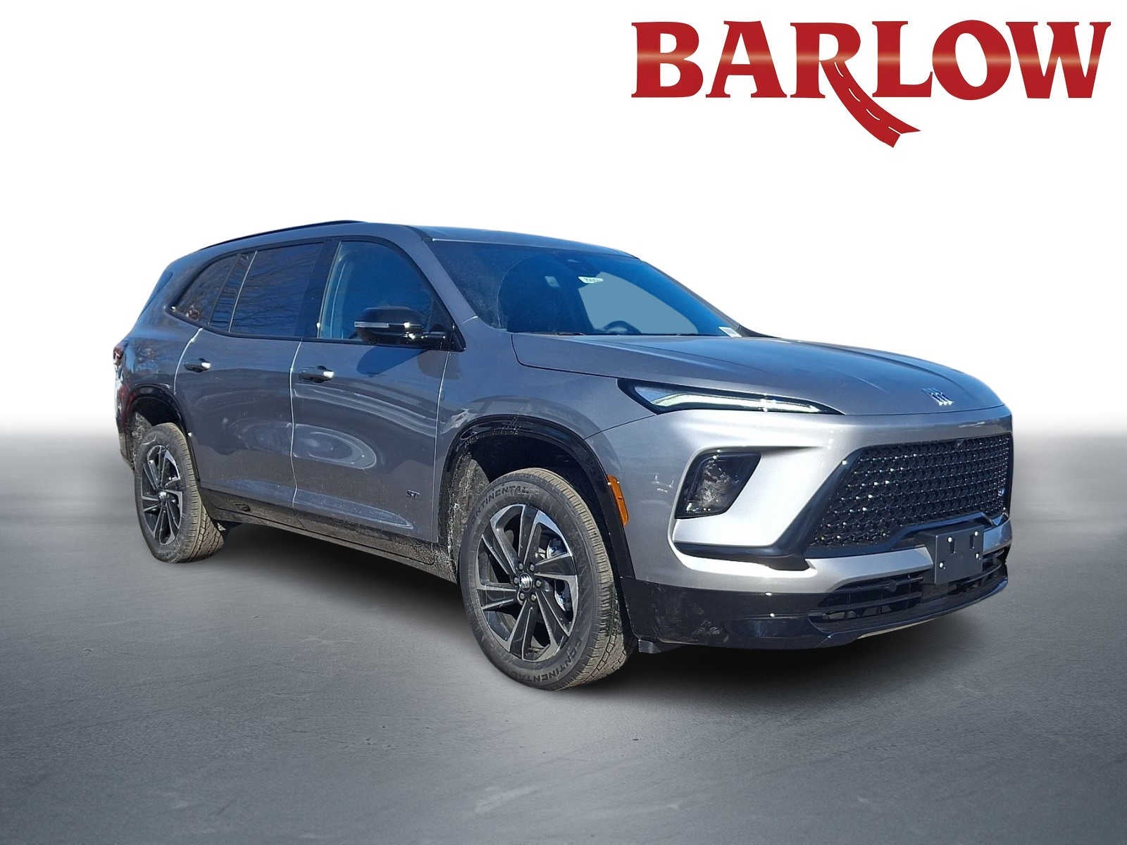 2026 Buick Enclave Sport Touring in Moonstone Gray Metallic — front three-quarter view