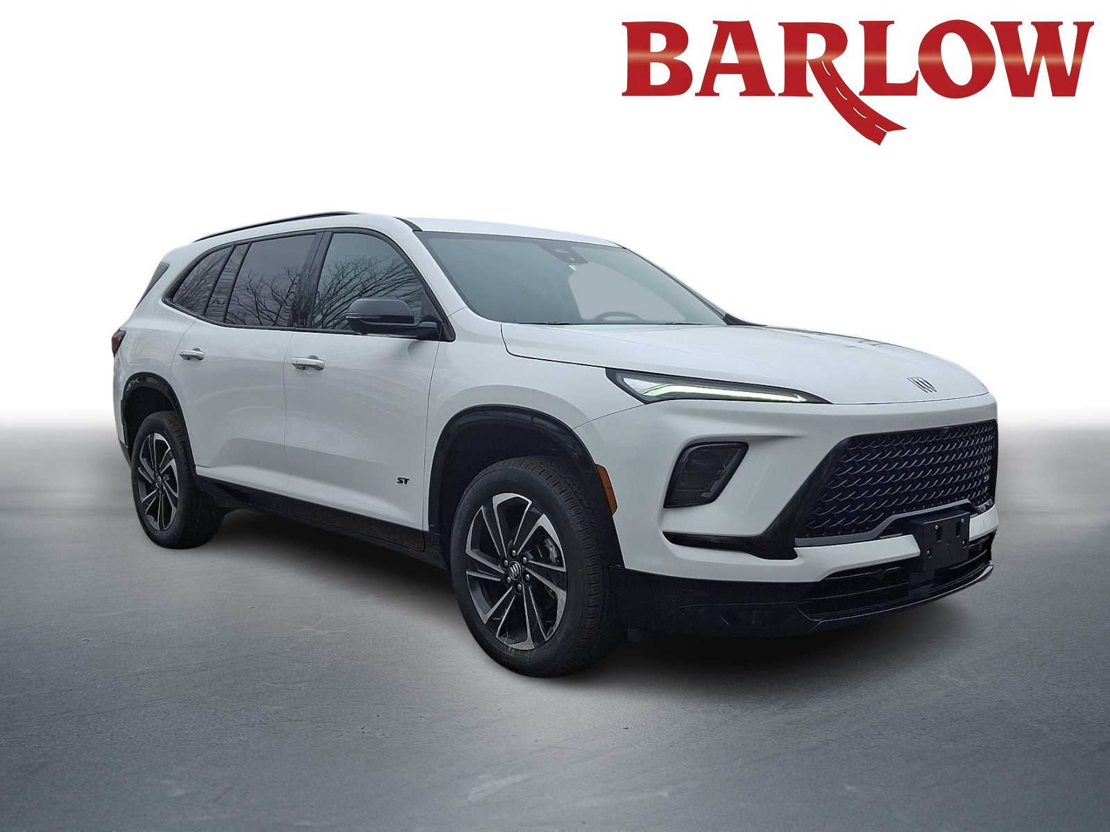 2026 Buick Enclave Sport Touring in Summit White — front three-quarter view
