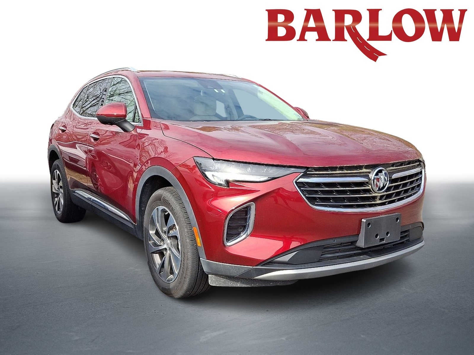 2022 Buick Envision Essence in Cinnabar Metallic — front three-quarter view